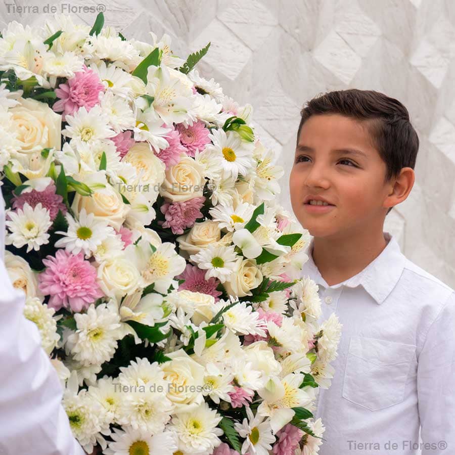 Corona funeral con detalle de niÃ±o